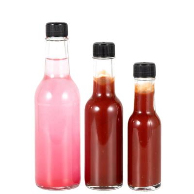 China 150ml 250ml 5oz Cheap Heatable Empty Daze Spice Dressing Chili Glass Salad Hot Sauce Bottle With Leak Proof Black Cap for sale