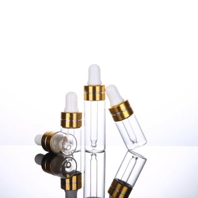 China Wholesale Cosmetic Empty Portable Mini Sample Vial Dropper Glass Bottle 1ml 5ml With Pipette Dropper Cap for sale