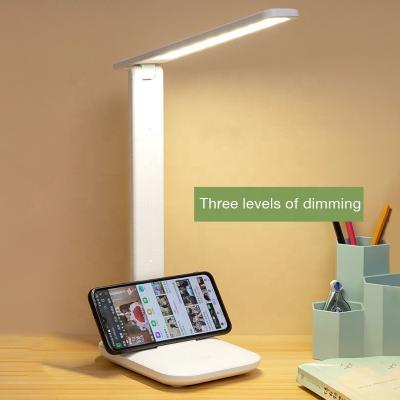 Chine As Stylish And Affordable Foldable Desk Lamp European LED Rotary Table Cell Phone Holder Lamp With Adjustable Brightness For Room Study à vendre