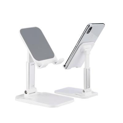 China Adjustable Adjustable Desktop Phone Stand Foldable Extension Phone Stand Holder Plastic Mobile Desk Phone Holder for sale