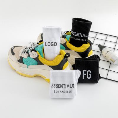 China Custom Thoughtful Fashion Mens And Womens Mid Socks Crew Anti-Fault Logo Letter Tube Custom Design Brand Cotton Socks for sale