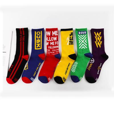 China QUICK DRY custom design fashion logo sports street cotton cotton crew skateboard running socks for sale