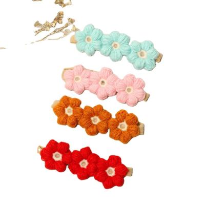 China Handmade Knitted Cute Lovely Traceless Circle Hair Flower Soft Kids Floral Nylon Children Hairband Knitted Woolen Headband for sale