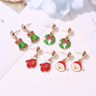 China Hot Sale Fashion Christmas Bell Santa Claus Earrings Classic Metal Reindeer Bell Snowflake Elk Earrings Christmas Tree Earrings for sale