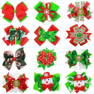 China Fashion Hot Selling Christmas Hair Hangers Snow Ribbon Bow Hairpins Printed Hair Clips Cloth High Quality Christmas Hair Clips for sale