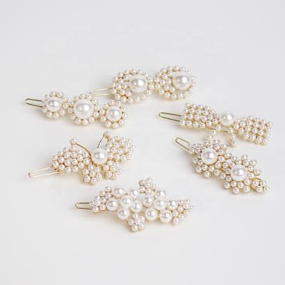 China Wholesale Lady pearl bowknot frog hair clip combine retro hair accessories fashion flower hair clips simple lady pearl bowknot frog hair clip for sale