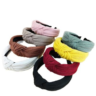 China Japan and Korean wholesale Autumn Winter Scrunchies Women Solid color knotted headband ladies embossed wide brim headbands for sale