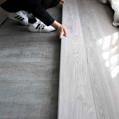 China Modern 0.5 mm thick wearlayer pvc sheet oak vinyl flooring malaysia spc floor 5mm thick for sale