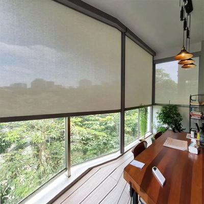 China Modern Commercial Grade Metal Windproof Electric Sunshade Roller Blind Patio Motorised Remote Blackout Outdoor Roller Blinds for sale