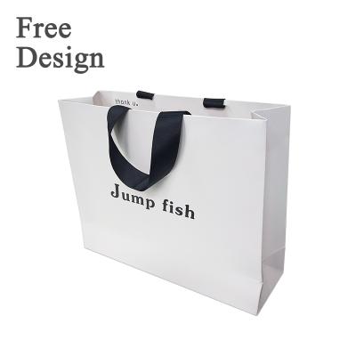 China 2022 Recyclable Paper Bag Manufacturers Wholesale Reusable Gift Packaging Bag Luxury Custom Paper Bag With Ribbon Handle for sale