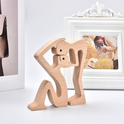 China Europe 2022 Valentine's Day gifts crafts home decorations wood desk carve wooden ornaments carving men women romantic figurines for sale