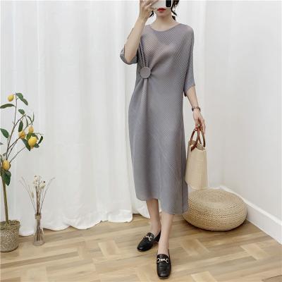 China Anti-wrinkle NOBLE Miyake Pleated Irregular Hem Twill O-Neck Loose Ao Button Decorate Long Casual Loose Ladies Summer Shift Dress for sale