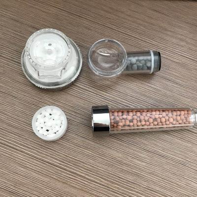 China Non-diverting Shower Filter Rainfall Best Price High Pressure Filtered Shower Bathroom 3 Functions Shower Head With Stone for sale