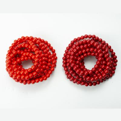 China Eco-friendly Rustic Country Red Christmas Wood Ornaments Wooden Bead Garland For Tree Decor for sale