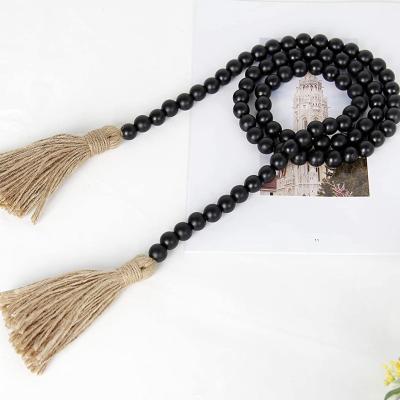 China 3 Pcs Eco-friendly Hot Selling Black Wooden Bead Garland Farmhouse Garland With Tassel For Home Decor for sale