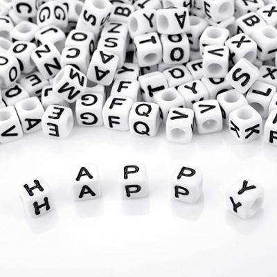 China Hot Sale 700 Pcs Educational Toys Black Writing White Letter Beads Square Alphabet Beads For Diy for sale