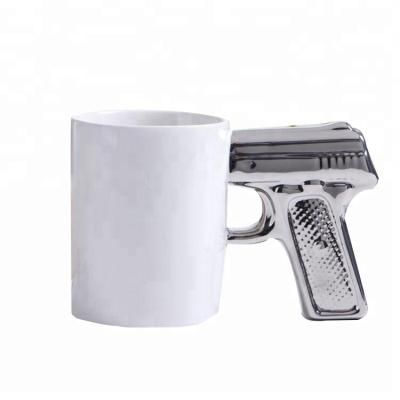 China Viable Creativity 11oz Gold Gun Handle Porcelain Coffee Mug Custom Logo for sale