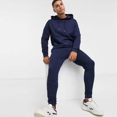 China Soft Breathable 100% Cotton White Navy Sport Gym Sweat Suit Mens Jogging Tracksuits Tracksuits for sale