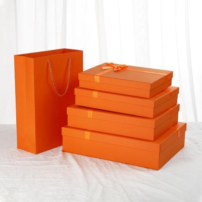 China Recyclable Wholesale Custom Luxury Ribbon Closure Paper Gift Boxes for sale