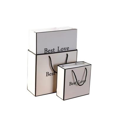 China Materials Gold Foil Paper Bags Recycled Luxury Personalized Paper Bag Gift Paper Bag for sale