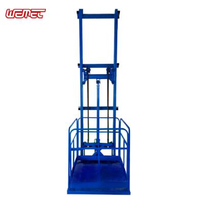 China Hotels WEMET 10m Hydraulic Rail Cargo Lift Equipment Outdoor Guide Goods Elevator Price for sale