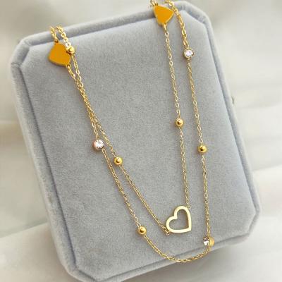 China TRENDY Hollow Love Double Stainless Steel Necklace Plated 18K Gold With Diamonds Necklace For Females for sale