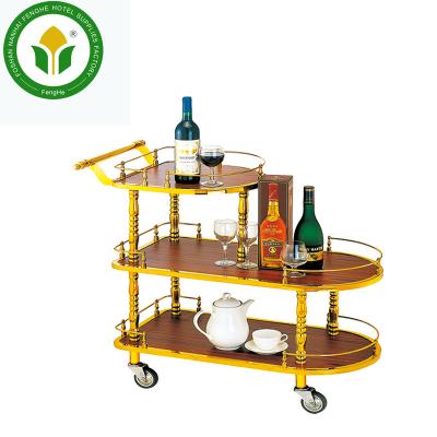 China Hotel Supply 3 Titanium Tier Four Wheels Golden Metal Wine Cart Liquor Cart for sale