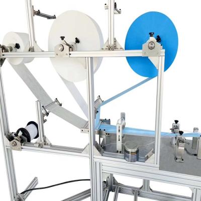 China Semi-automatic disposable mask machine for home use for sale