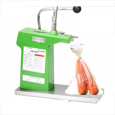 China Aluminum Food Nail Tying Manual Bale Tying Machine 711 Supermarket Sealing Machine for sale