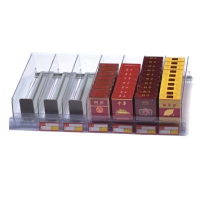 China Multifunctional Cigarette Display Stand Retail Rack Cigarette Display Trays Shelf Pusher Spring System for sale