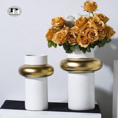 China Minimalist Unique Shape Matte Gloss White And Black Porcelain Flower Vase Cheap Ceramic And Glossy Color for sale