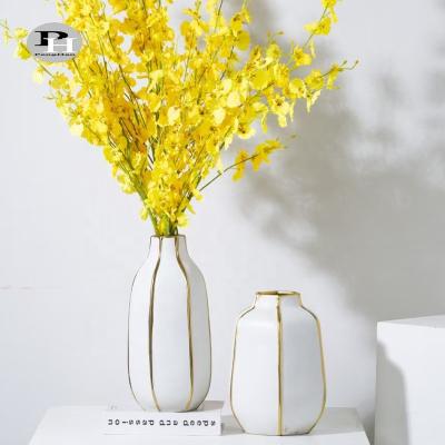 China New Minimalist Modern Luxury Ceramic Vertical Line Gold Style Porcelain Flower Vases For Home Decor for sale