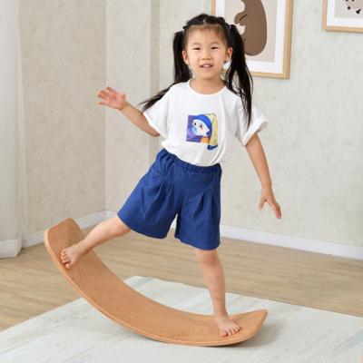 China Eco-Friendly Educational Yoga Toys Preschool Training Wooden Winding Rocker Shimmy Balance Board Kids for sale