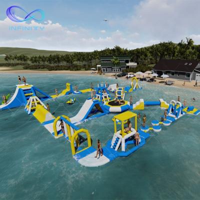 China Sports Park Inflatable Infinity Water Amusement Park 100 Capacity Floating Inflatable Water Park On Sale for sale