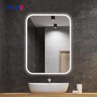 China Luxury Fog Light Amplifying Bathroom Magnifying Wall Mounted Smart Led Mirror For Hotel for sale