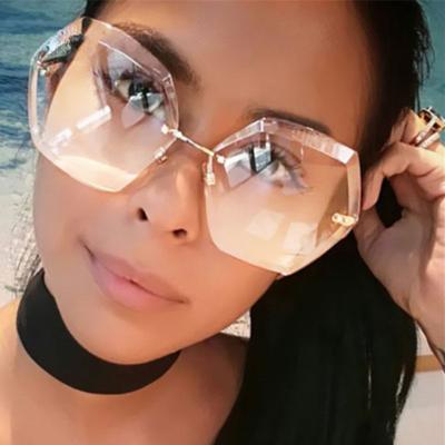 China Fashion Sunglasses Shape To Eyewear 2021 UV400 Oversized Shades Sun Glass Women Lady Feminine Rimless Sunglass for sale