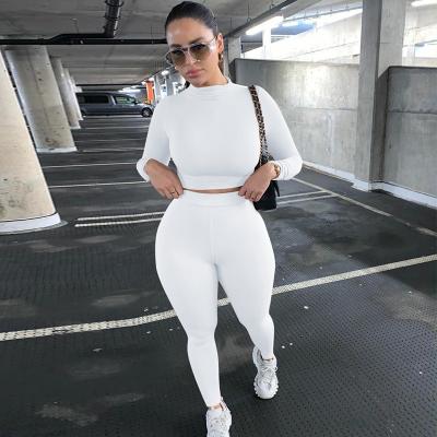 China 2021 Reversible 2 Pieces Sports Long Sleeve Pure Slim Color Breathable Womens Fashionable Sports Suit Set Women for sale