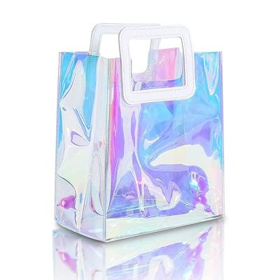 China Fashion Moisture Proof Clear Holographic Tote Bag Iridescent PVC Handbag Gift Envelope Bags With Handle for sale