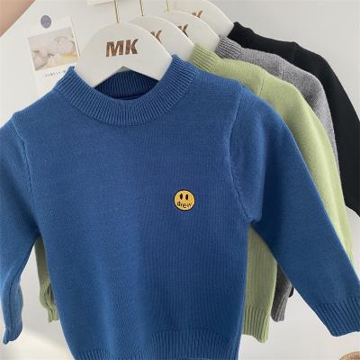 China Wholesale cartoon anti-pilling smile face pattern knitted sweaters boys and girls sweaters baby round collar clothing for sale