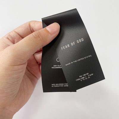 China Sustainable Wholesale Black Wash Label Two Piece Size Clothing Labels High Quality Care Labels For Clothing for sale