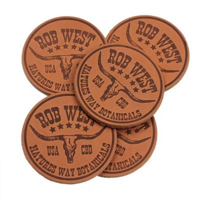 China Sustainable Clothing Labels Supplier Custom Brand Logo Heat Press Real Leather Patches With Adhesive for sale