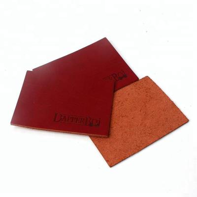 China Real Genuine Genuine Garments Leather logo made to order high quality workable fittings for men for sale