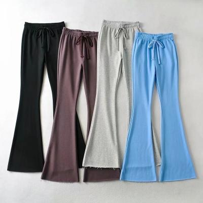 China Anti-wrinkle women sexy metal hollow waist high flared pants news yoga slim casual fashion stretch pants custom colors for sale