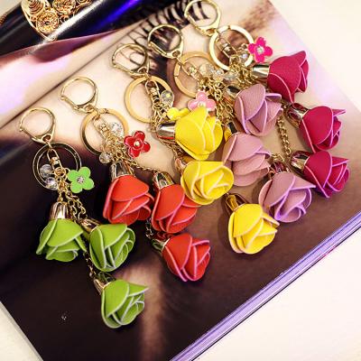 China New Environmental Friendly Hot Pendant Leather Tassel Rose Camellia Keychain Metal Car Key Chain PU Keychain for sale