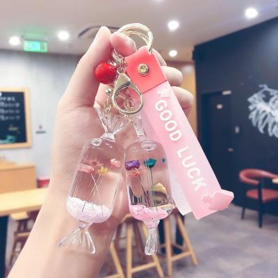 China Creative Acrylic Floating Key Chain Liquid Floating Dangle Pendant Key Chain Flower Cartoon Immortal Flower Eco-friendly for sale