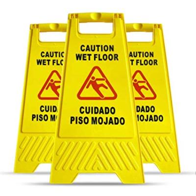 China Customized wet packaging yellow caution floor sign with bilingual warning signs for commercial use good as a folding sign at a risk for sale