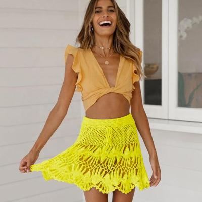 China 2022 Design 8 Colors Sex Waist Beach Wear Anti-static Crochet Lace Short Pleated Sexy Skirts For Woman for sale