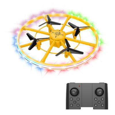 China UFOs Handheld Obstacle Avoidance 2.4g Remote Control Interactive Flying Saucer Led Mini Drone Helicopter Spin Toy Raise Light rc Drone UFO Magic Ball for sale