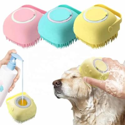 China 2023 Summer Silicone Drop Stocked Ship 2 In 1 Dispenser Cat Dog Bath Massage Brush Self Cleaning Pet Grooming Shower Brush Shampoo Dispenser for sale