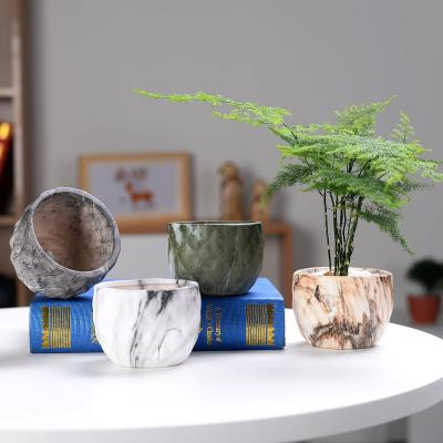 China Home decoration not easily deformed providing the Nordic ceramic flower pot around the flower pot for sale